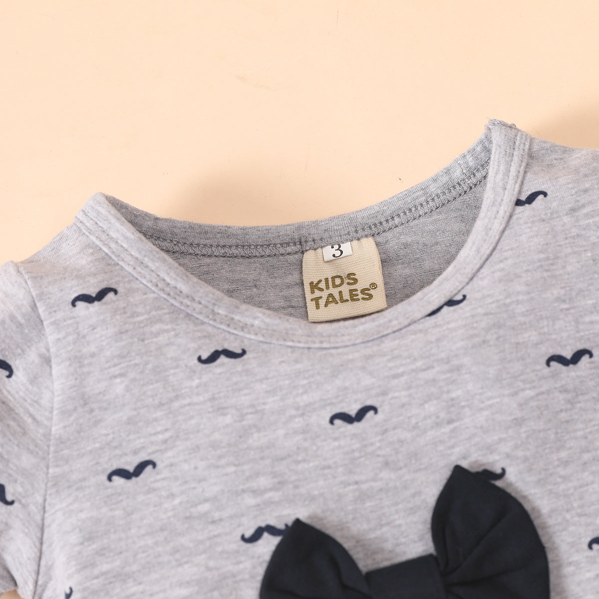 Summer baby bow tie short-sleeved romper original round neck cotton beard print short romper
