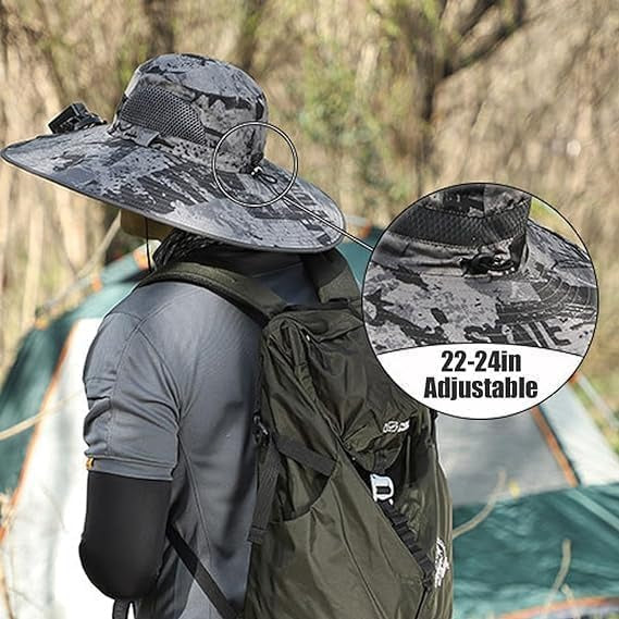 Person wearing a large camouflage sun hat with an adjustable strap